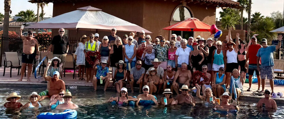 Community social gathering at The Palms resort pool"